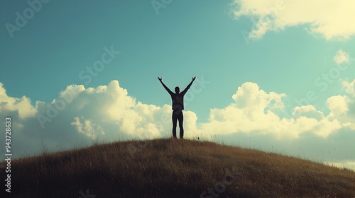 Person Silhouetted on Hilltop Raising Arms in Victorious Against Breathtaking Scenic Landscape with Mountains Sky and Sunlight