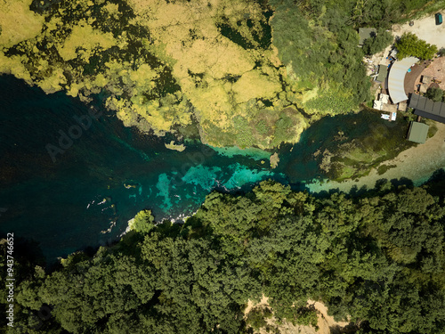 Aerial drone panorama landscape of Blue Eye (aka Syri i Kalter, springs of Bistrice) water spring. Located in Muzine in Finiq municipality, Albania