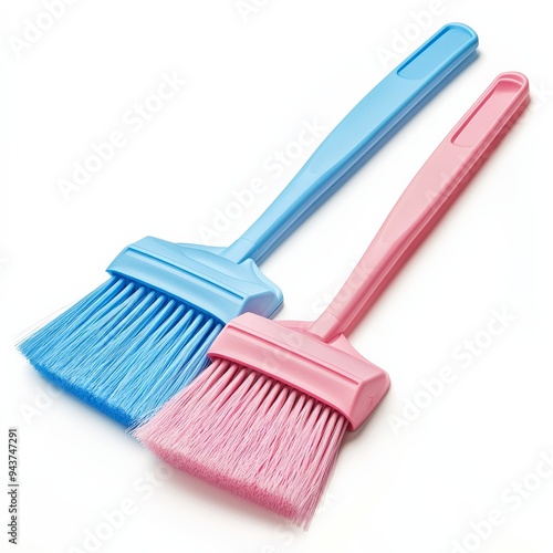 Blue and Pink Cleaning Brushes on White Background.