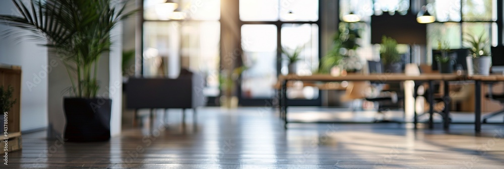 Modern office interior with blurred background showcasing sleek flooring, potted plants, and natural light streaming through large windows, creating a fresh workspace ambiance. Modern office interior with blurred background showcasing sleek flooring, potted plants, and natural light streaming through large windows, creating a fresh workspace ambiance.