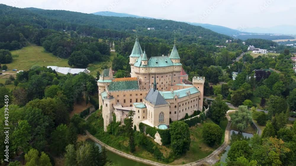 A stunning drone video of Bojnice Castle in Slovakia captures its fairy-tale architecture, picturesque towers, and lush gardens, highlighting the medieval charm and scenic views