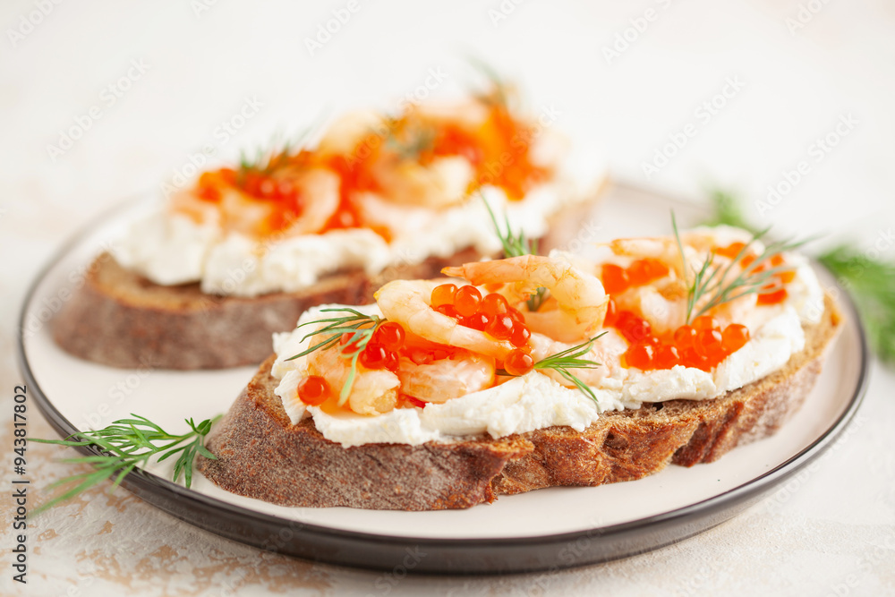 Toast skagen - shrimps and red caviar on bread. Classic swedish sandwich. Toast skagen - shrimps and red caviar on bread. Classic swedish sandwich.