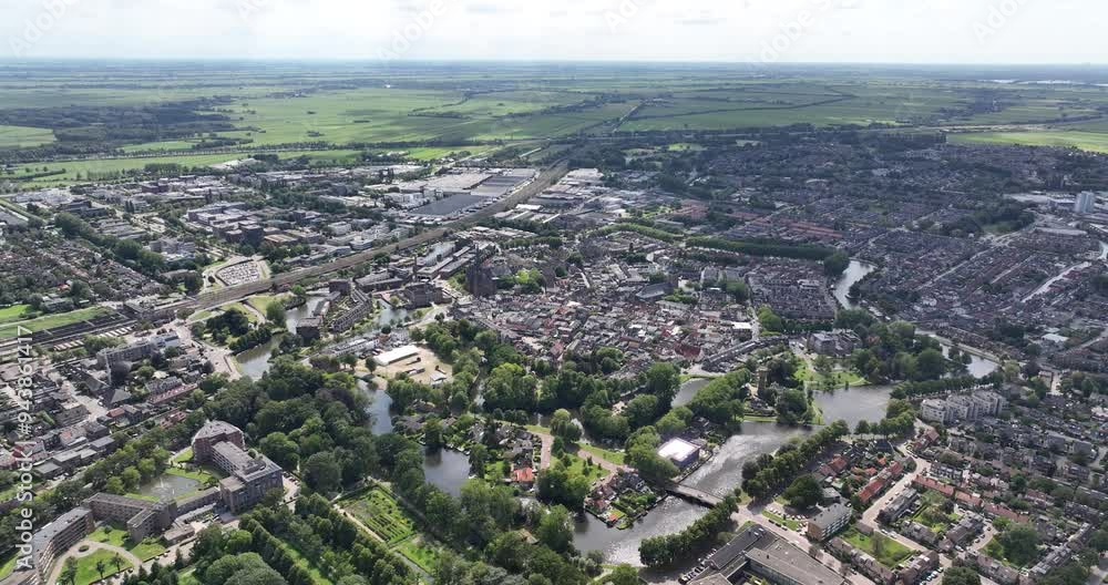 Aerial drone view video on Woerden, Utrecht, The Netherlands city over view, historic city center. Aerial drone view video on Woerden, Utrecht, The Netherlands city over view, historic city center.