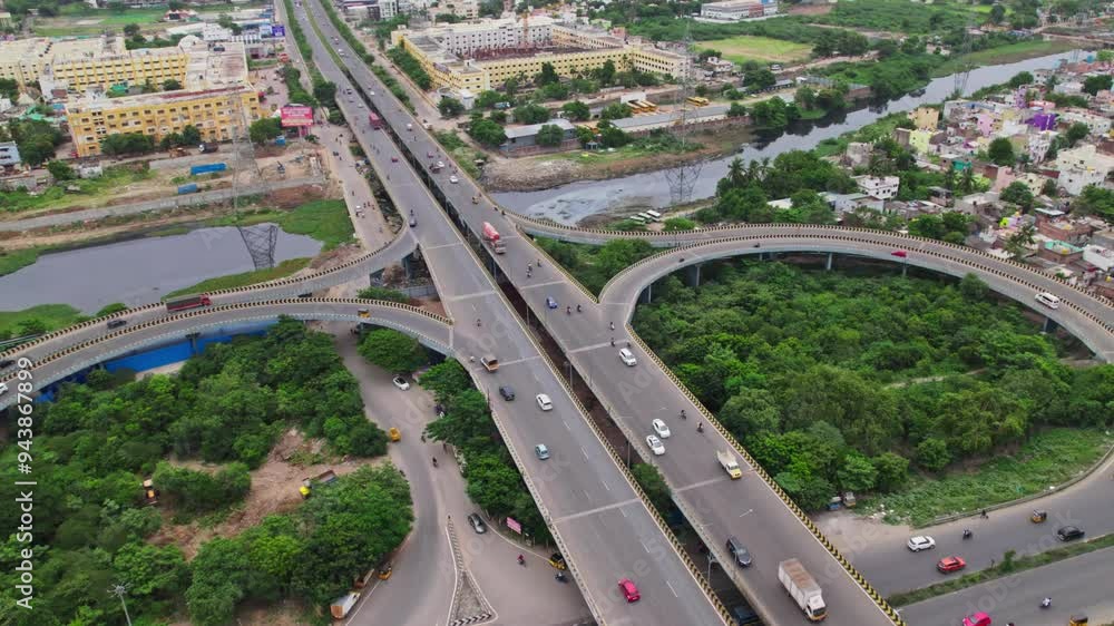 vehicles going in maduravoyal bypass flyover bridge in chennai, tamil nadu, india. drone shot, 4k, daytime vehicles going in maduravoyal bypass flyover bridge in chennai, tamil nadu, india. drone shot, 4k, daytime