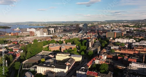 Drone Ascends to Reveal Oslo Sentrum (City Centre) at Sunrise in Summer photo