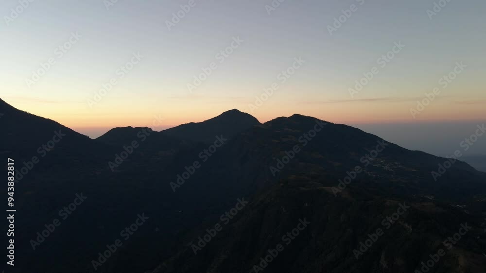 Volcano mountainous region Atitlán, Guatemala ,sunset sunrise horizon. aerial Volcano mountainous region Atitlán, Guatemala ,sunset sunrise horizon. aerial
