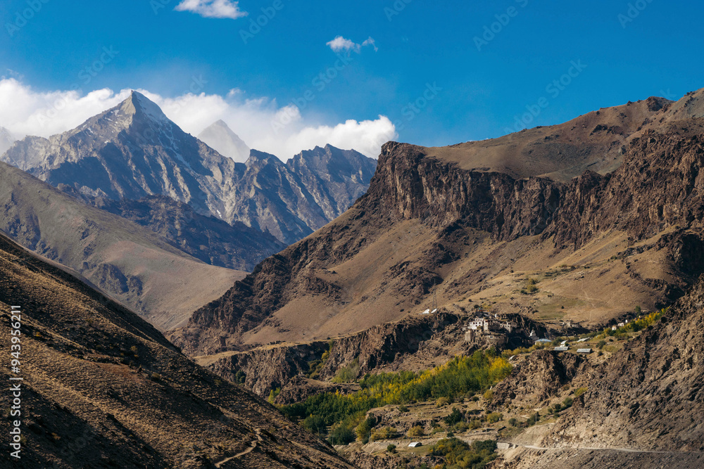 Beautiful landscape with Himalayan mountains with a trail on route to Dorzong Buddhist Monastic Institute in Zanskar, Ladakh; Zanskar, Ladakh, India Beautiful landscape with Himalayan mountains with a trail on route to Dorzong Buddhist Monastic Institute in Zanskar, Ladakh; Zanskar, Ladakh, India