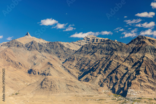 Arid and rugged mountainous landscape with a road between Zangla and Wanla, Zanskar, Ladakh; Zanskar, Ladakh, India photo