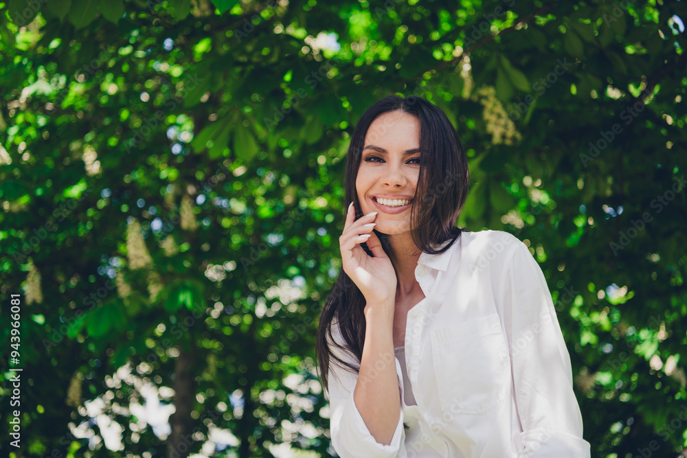 Photo of young cheerful woman charming smile dreamy wear white outfit walk park sunny summer weather outside Photo of young cheerful woman charming smile dreamy wear white outfit walk park sunny summer weather outside