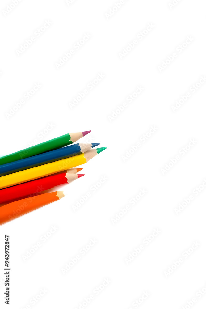 A vibrant collection of colored pencils arranged in a row, showcasing a variety of colors including red, blue, green, yellow, and orange against a white background. A vibrant collection of colored pencils arranged in a row, showcasing a variety of colors including red, blue, green, yellow, and orange against a white background.