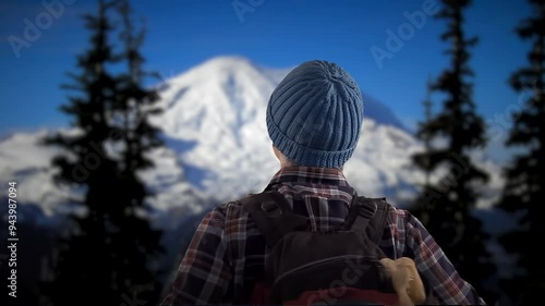 Wallpaper Mural Hiker standing below snow capped mountain Torontodigital.ca