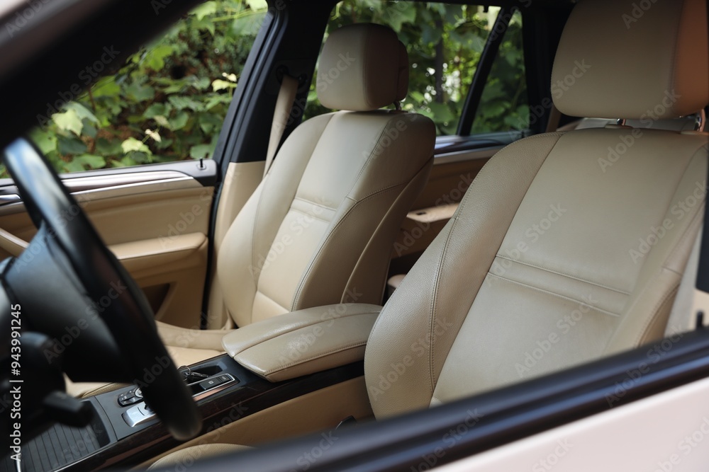 Steering wheel and leather seats inside car Steering wheel and leather seats inside car