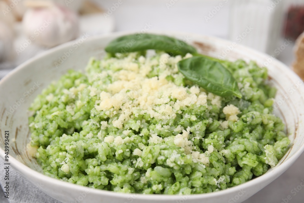 Tasty spinach risotto served on table, closeup Tasty spinach risotto served on table, closeup