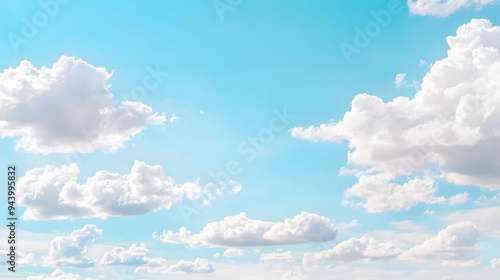 Bright blue sky with fluffy white clouds creating serene atmosphere. scene evokes sense of calm and tranquility.