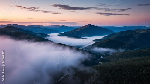 Wallpaper Mural A breathtaking panorama of misty mountains at sunset, showcasing serene nature and expansive beauty Torontodigital.ca