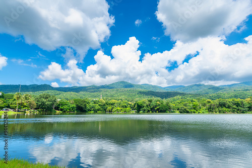 a public place leisure travel landscape lake views at Ang Kaew Chiang Mai University and Doi Suthep nature forest Mountain views spring cloudy sky background with white cloud. photo