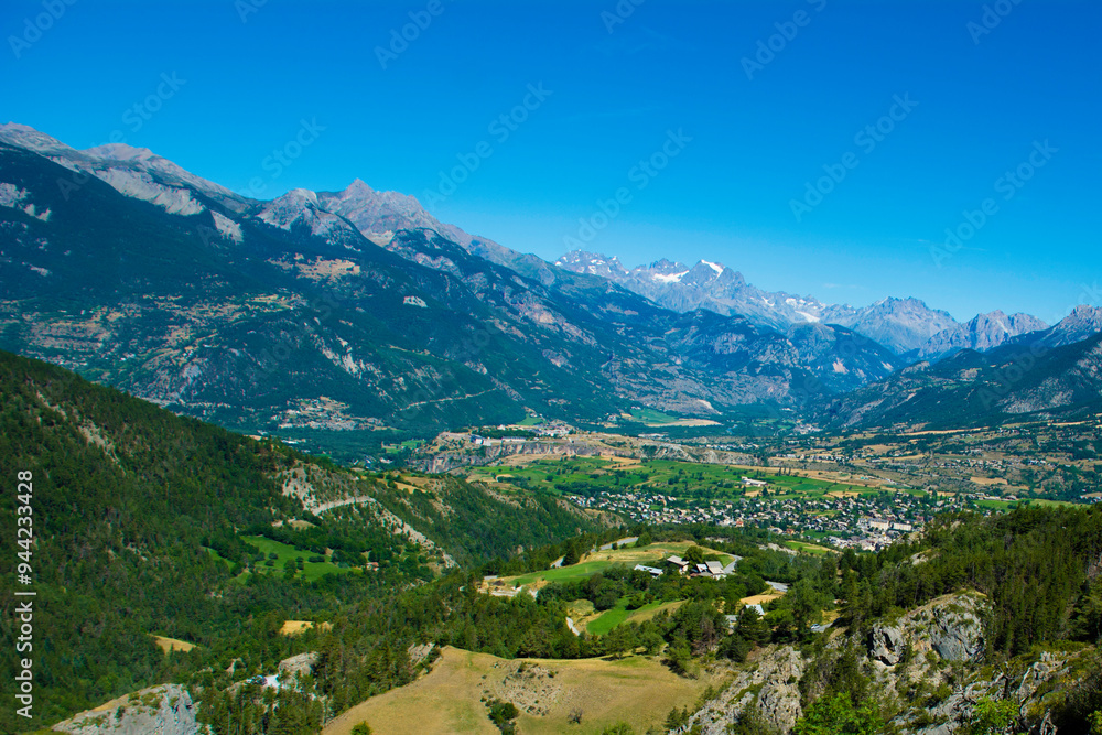 Panoramic view of the Swiss mountains and valleys in summer
Panoramic view of the Swiss mountains and valleys in summer