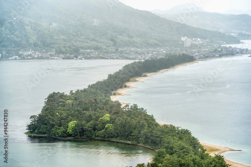 View from the mountain top with the Amanohashidate Sandbar, Japans three most scenic views. Pine covered sandbar photo