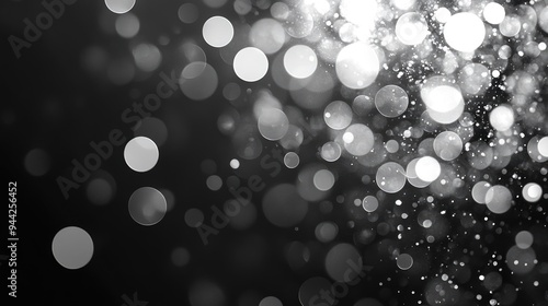 Abstract grey bokeh circles creating a stunning background illustration with shimmering particles