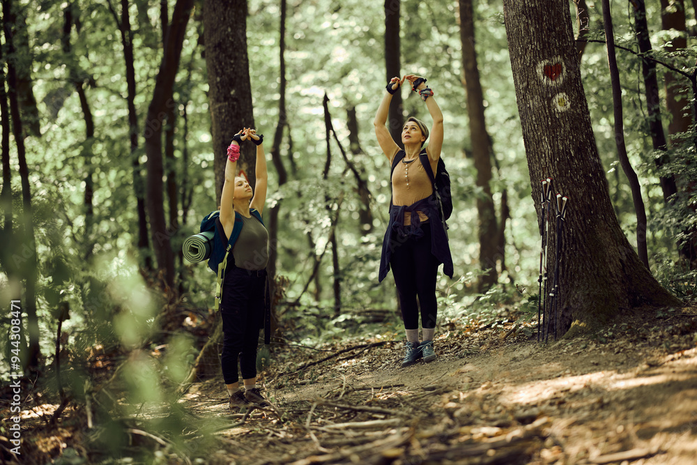 Mother And Daughter Enjoying Taking Deep Breath In The Forest Mother And Daughter Enjoying Taking Deep Breath In The Forest