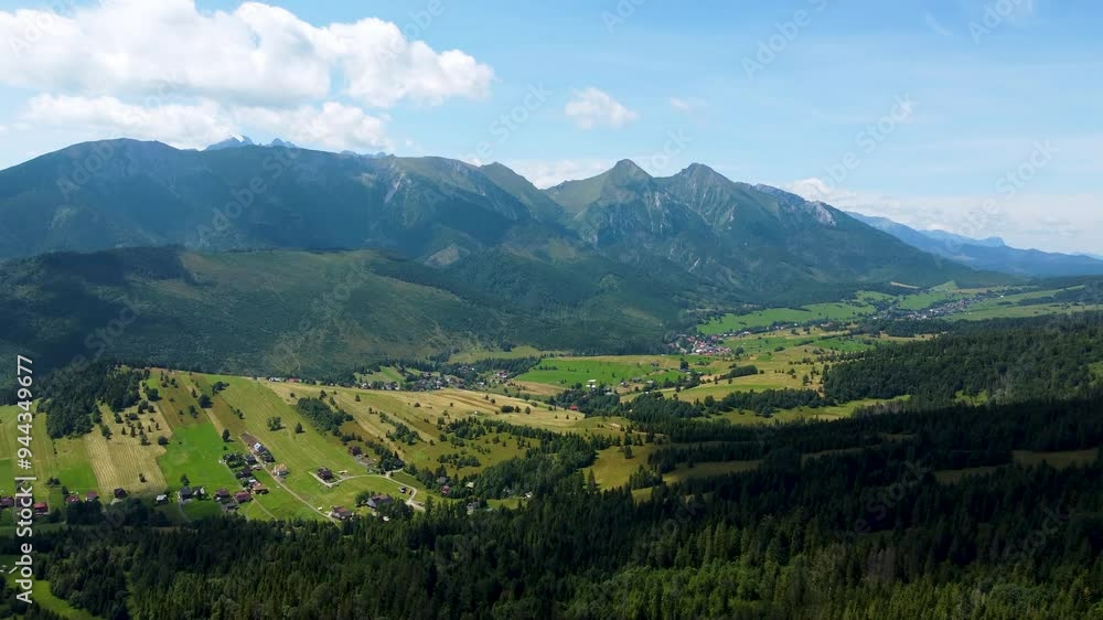 A breathtaking drone video of Treetop Walk Bachledka in Slovakia, showcasing the elevated wooden pathway winding through the treetops, offering stunning panoramic views of the surrounding forests and A breathtaking drone video of Treetop Walk Bachledka in Slovakia, showcasing the elevated wooden pathway winding through the treetops, offering stunning panoramic views of the surrounding forests and