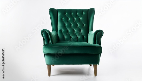 the chair is an emerald green armchair on a white background photo