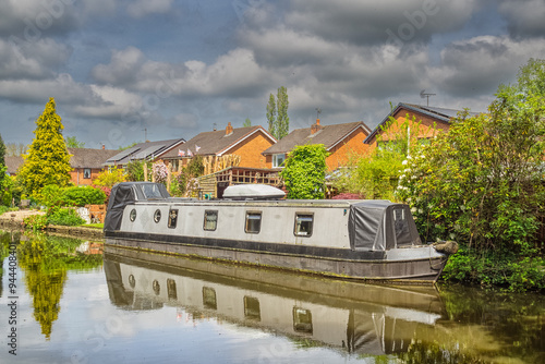 Narrowboats mowed on the Leeds Liverpool canal at Parbold in Lancashire photo