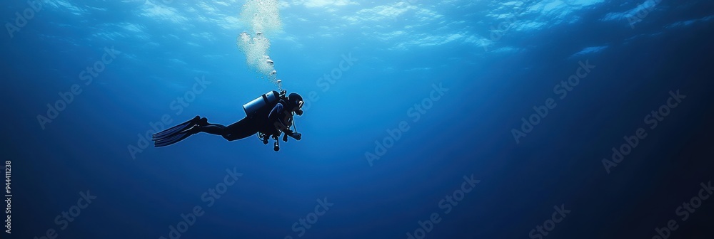 Naklejka premium Diver in deep sea