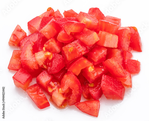 Billede på lærred Peeled and diced tomatoes isolated on white background