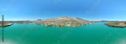 Mediterranean coastline in Turkey, with yachts on very clear blue water photo