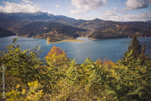 mountain view in autumn overlooking lake. Beautiful autumn colours near the bicaz lake,romania photo