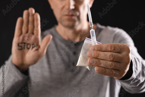 Mature junkie with drugs an...