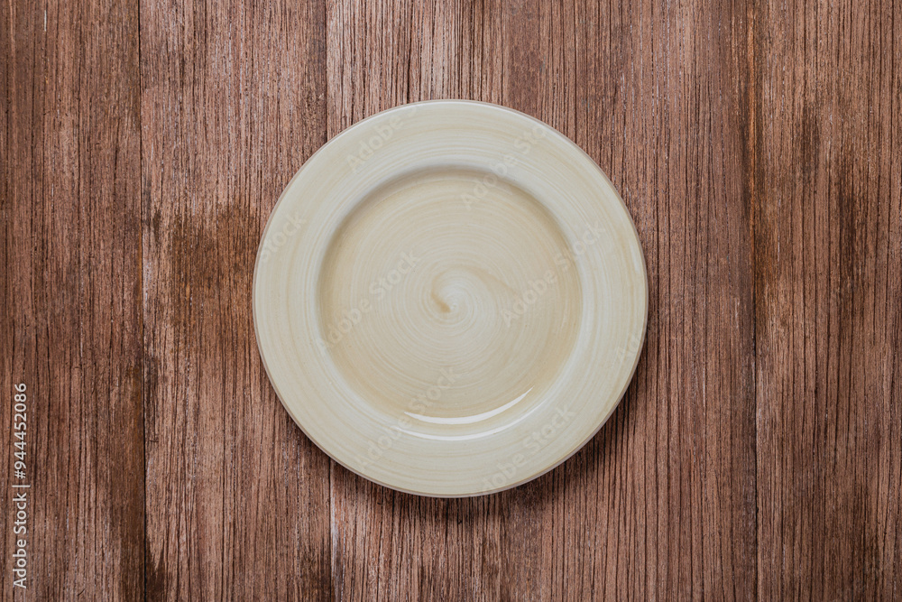 flat lay of ceramic plate mock up over rustic wooden brown table flat lay of ceramic plate mock up over rustic wooden brown table