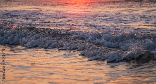 Avalon, New Jersey, USA - Ocean waves at sunrise off the beach in Avalon New Jersey on the southern New Jersey shore south of Atlantic City
