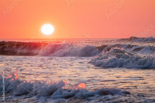 Avalon, New Jersey, USA - Ocean waves at sunrise off the beach in Avalon New Jersey on the southern New Jersey shore south of Atlantic City
 photo