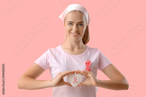 Young woman with ribbon and...