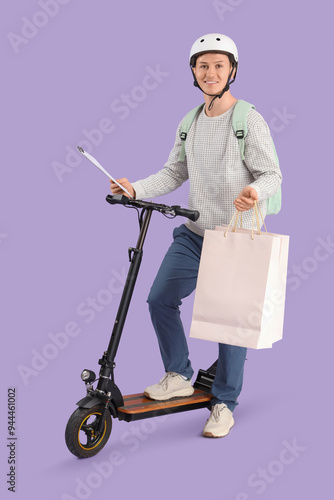 Male courier with shopping ...