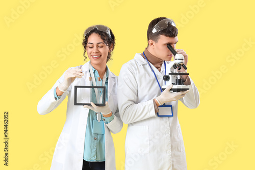 Young chemists with test tu...