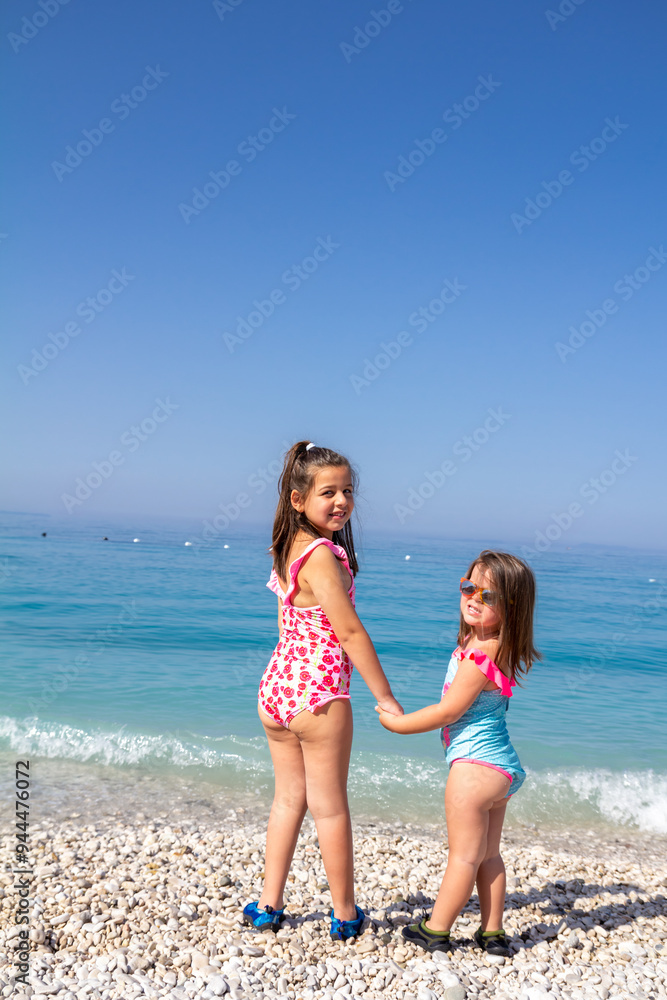 little girls on the beach