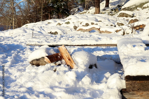 Wallpaper Mural Park bench covered in snow. December nature. Järfälla, Stockholm, Sweden. Torontodigital.ca