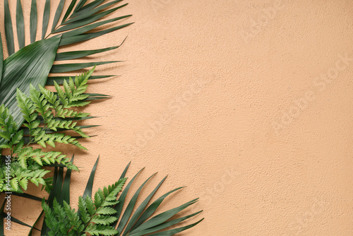 Wallpaper Mural Different green tropical leaves on beige background Torontodigital.ca