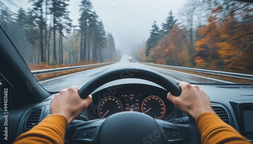 The point-of-view perspective from a driving car on a highway captures the sense of motion and travel
 photo