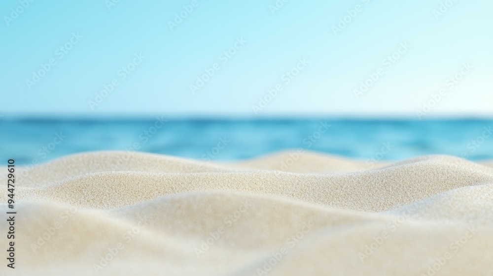 A beach with a blue ocean in the background A beach with a blue ocean in the background