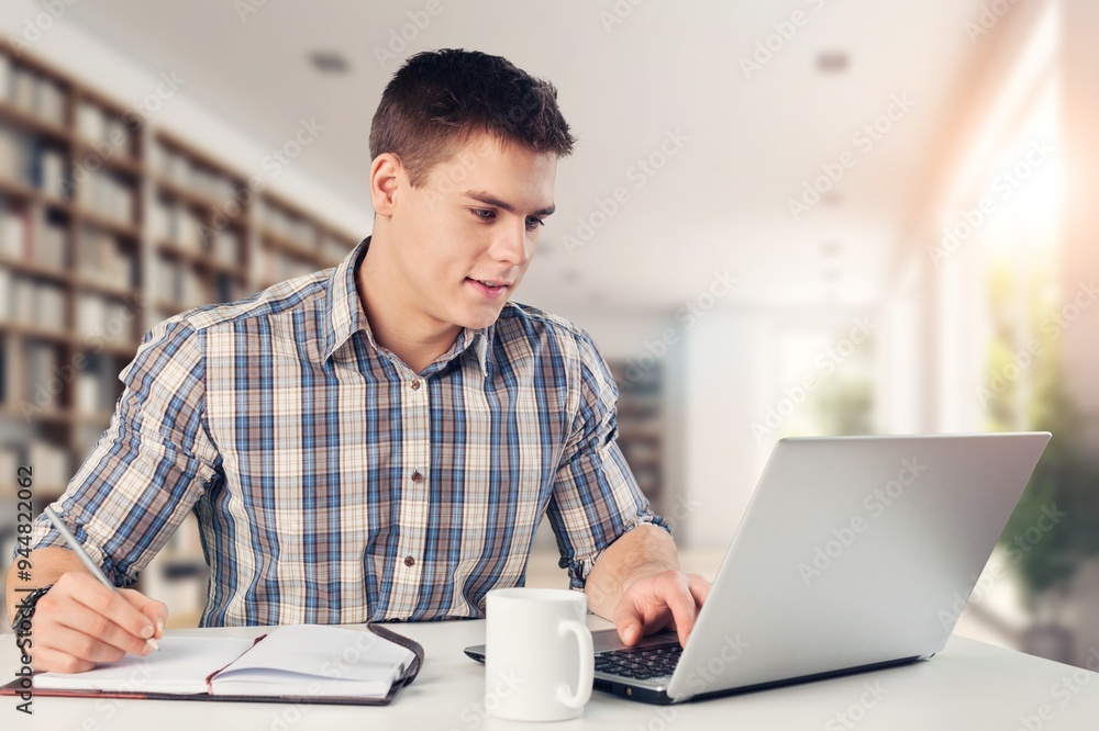 Happy college or school student at a library interior Happy college or school student at a library interior