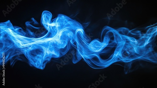 Abstract blue fire effect isolated on a black background Digital light in motion