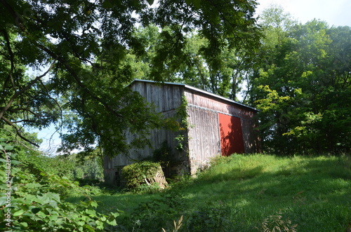 old red barn in the countryside