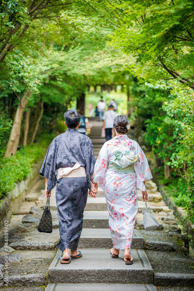 A couple wearing Japanese Yukata back view. Kyoto, Japan. A couple wearing Japanese Yukata back view. Kyoto, Japan.