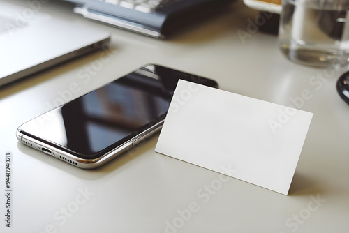 Wallpaper Mural An empty white business card mockup is presented near to a smart phone in an office desk Torontodigital.ca
