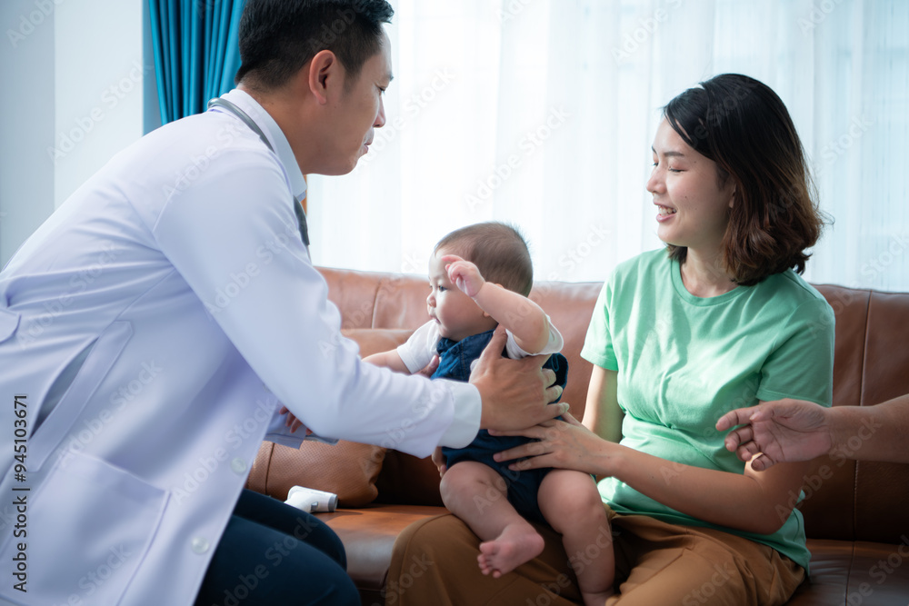 A little child and his family visit the doctor for a routine health checkup A little child and his family visit the doctor for a routine health checkup