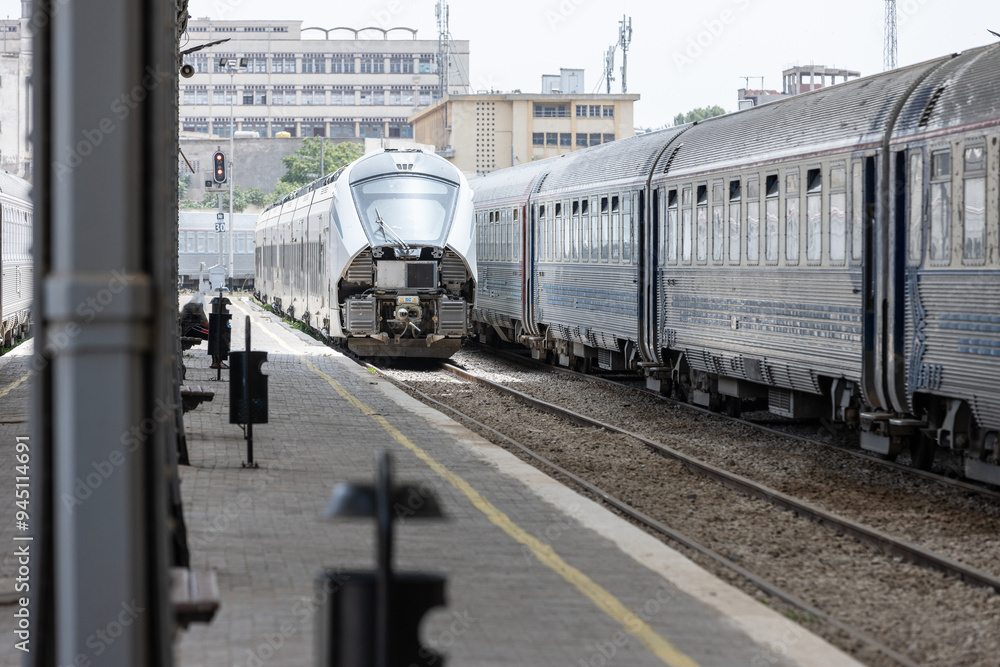 Inside view of a train station in Oran, Algeria. Beautiful vintage train station, platform view, with trains departing to Algiers and other cities.